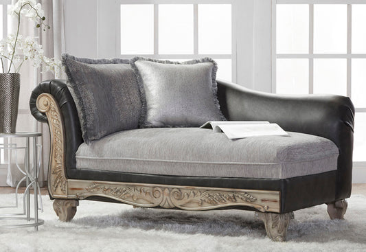 Elegant chaise lounge with black leather and grey fabric upholstery featuring ornate carved wooden legs