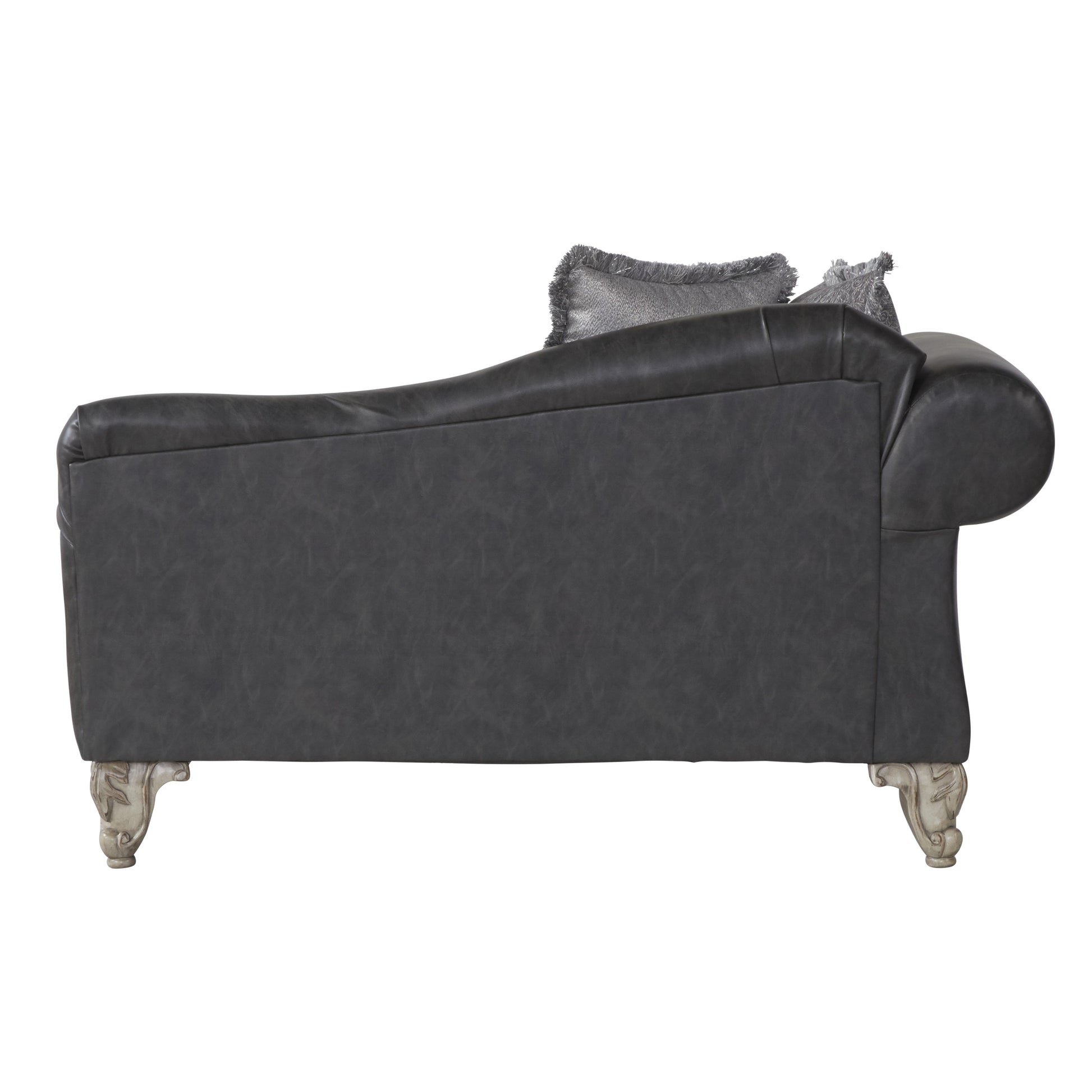 Dark gray faux leather chaise lounge with decorative carved legs