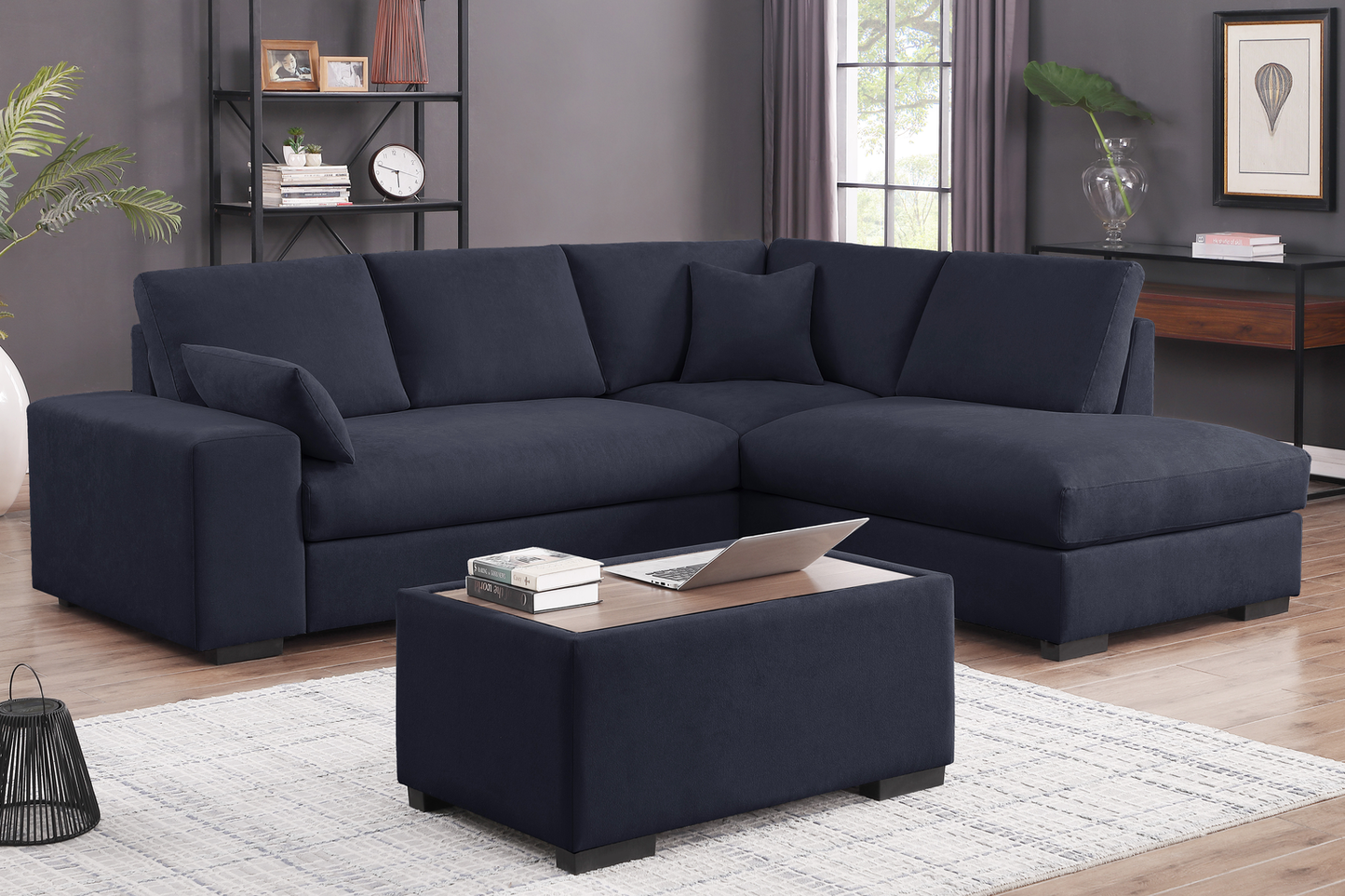 Navy fabric sectional sofa with chaise and plush cushions perfect for modern living rooms