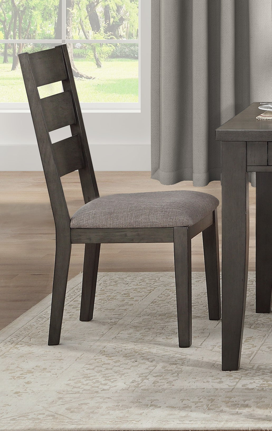 Gray upholstered dining chair with slatted backrest and wooden frame