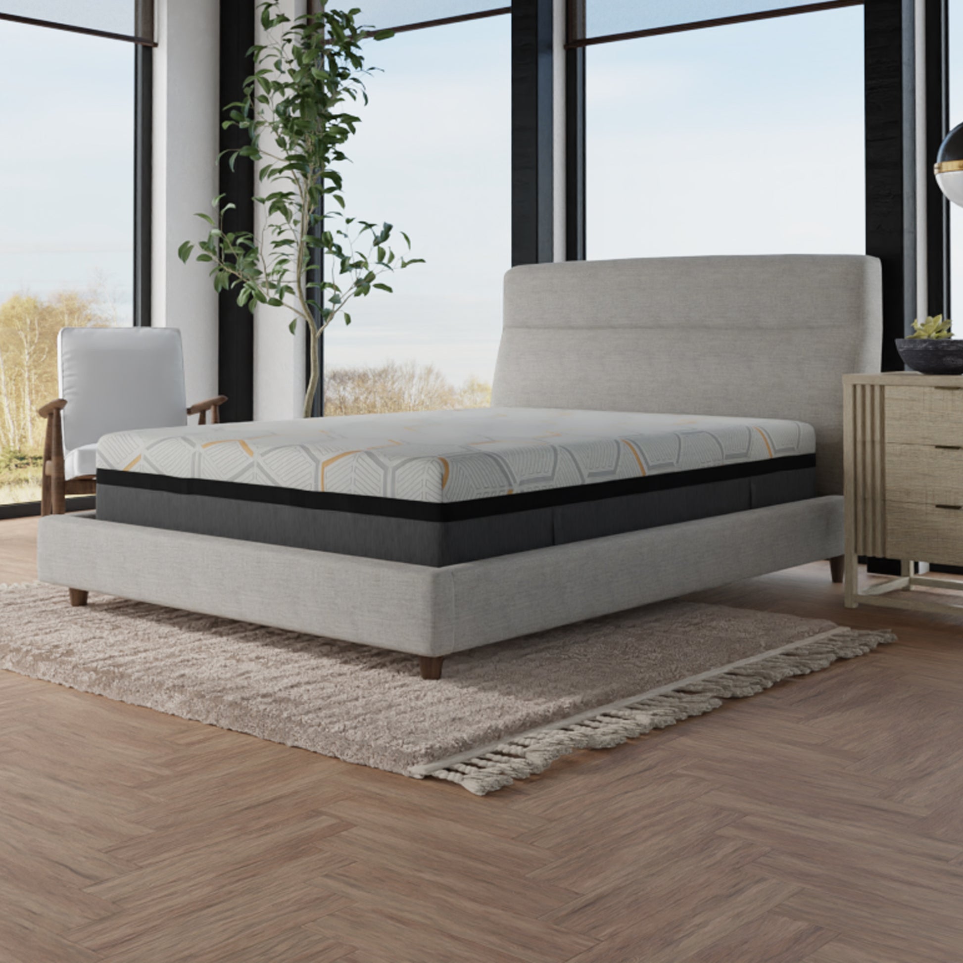 Plush king size mattress with a geometric pattern top and charcoal grey sides