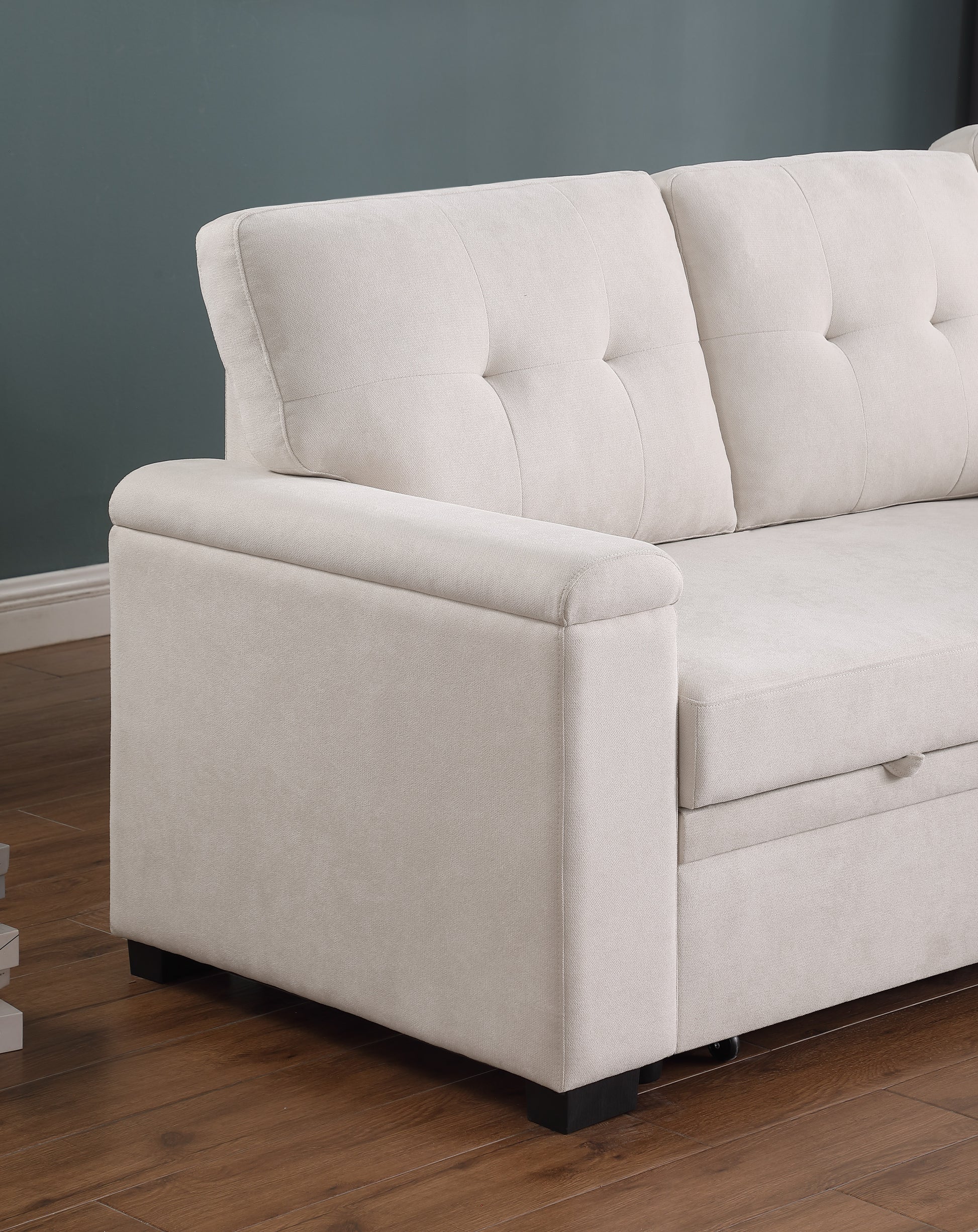 Cream fabric sectional sofa with tufted back cushions perfect for living rooms
