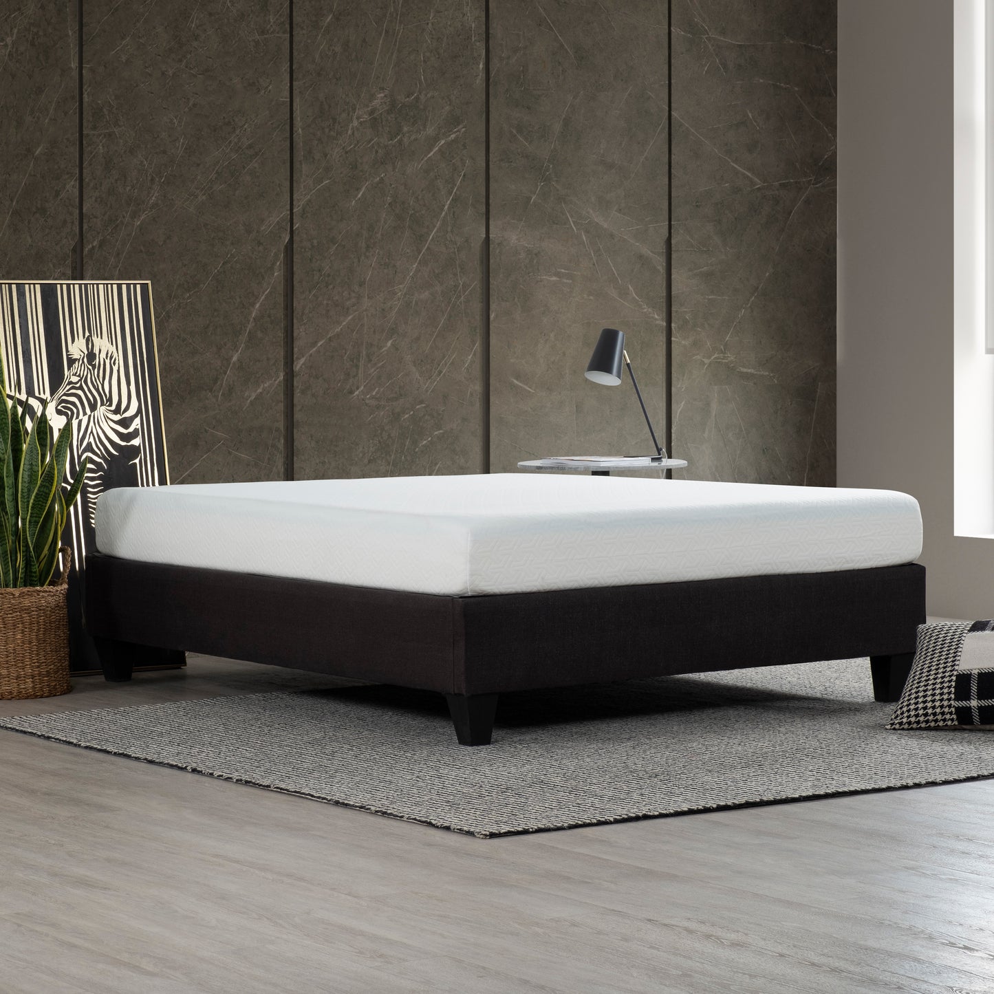 Queen size memory foam mattress with a dark grey fabric base and wooden legs