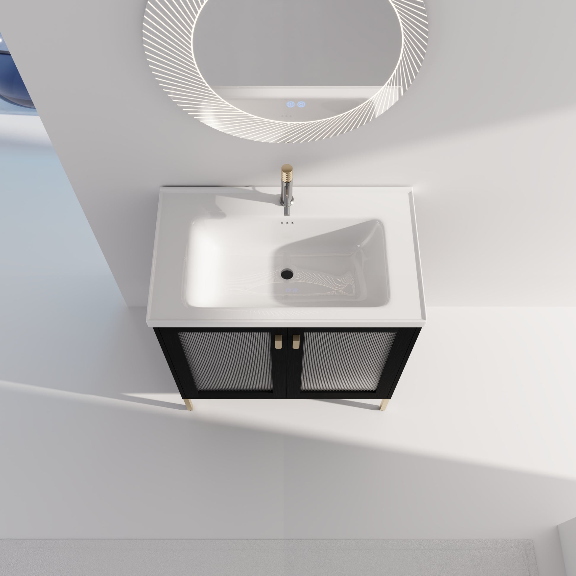 Modern black vanity with fluted glass doors and gold legs featuring a white ceramic sink and gold faucet