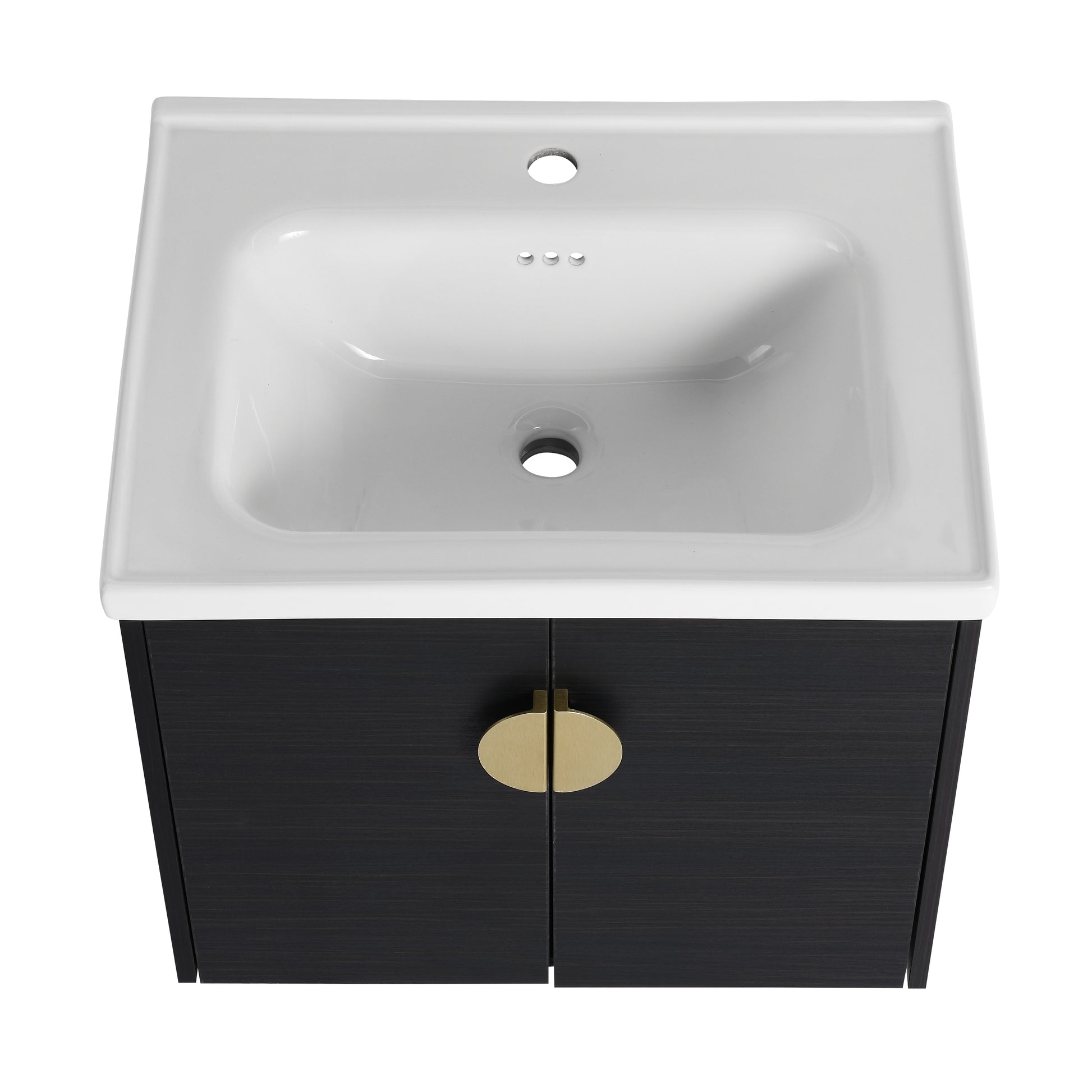 Modern white ceramic bathroom vanity with dark wood cabinet and brass handles