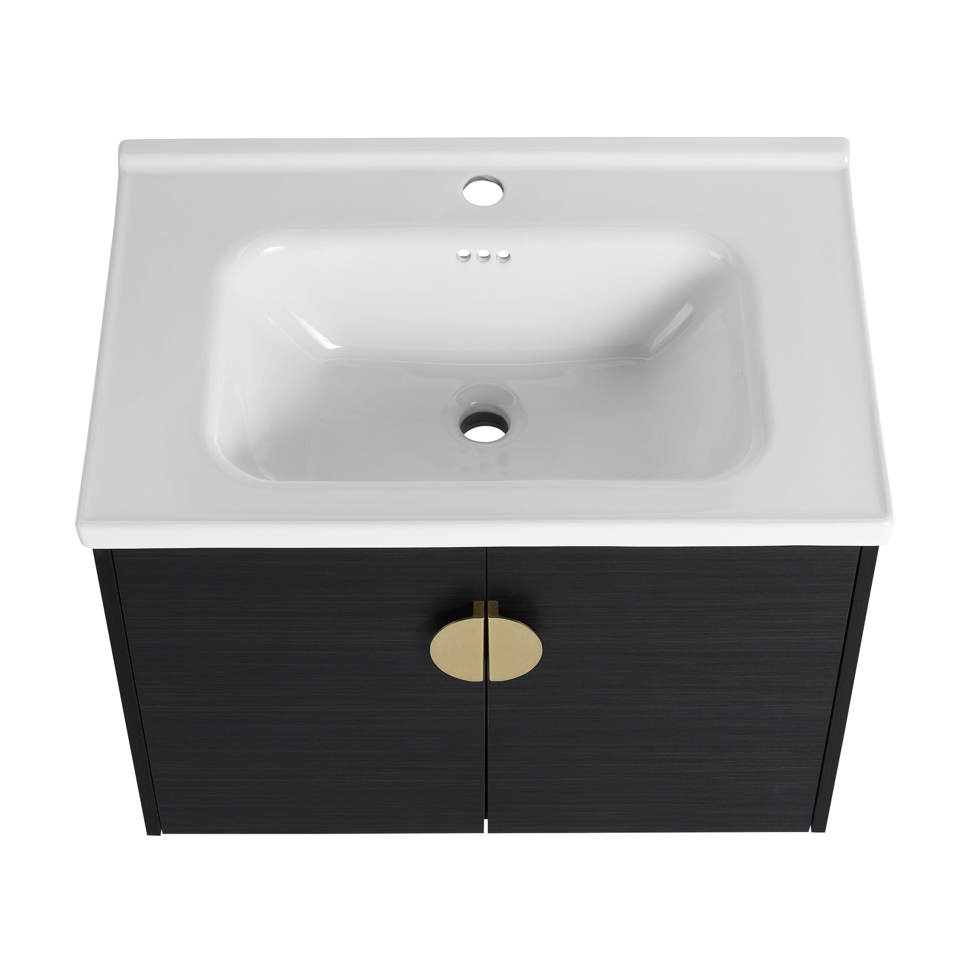White ceramic sink with dark wood vanity and gold pull handles
