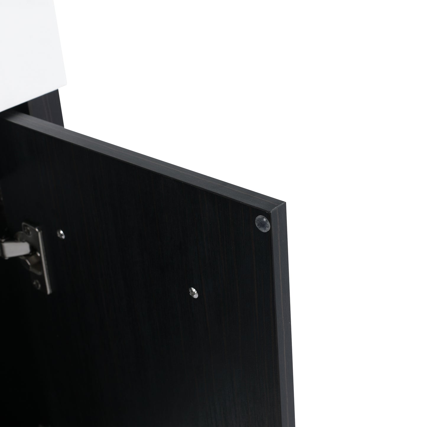 Closeup of a dark wood cabinet door showing hinges and clear stoppers