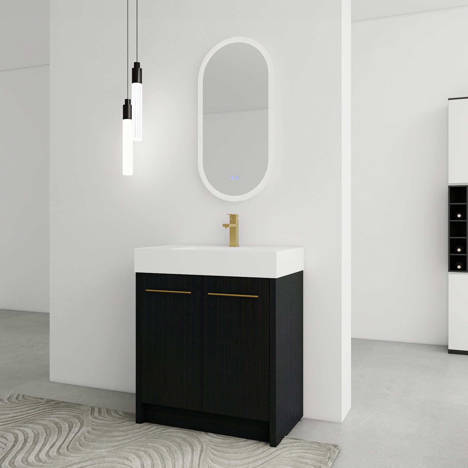 Modern black vanity with gold pulls and white countertop