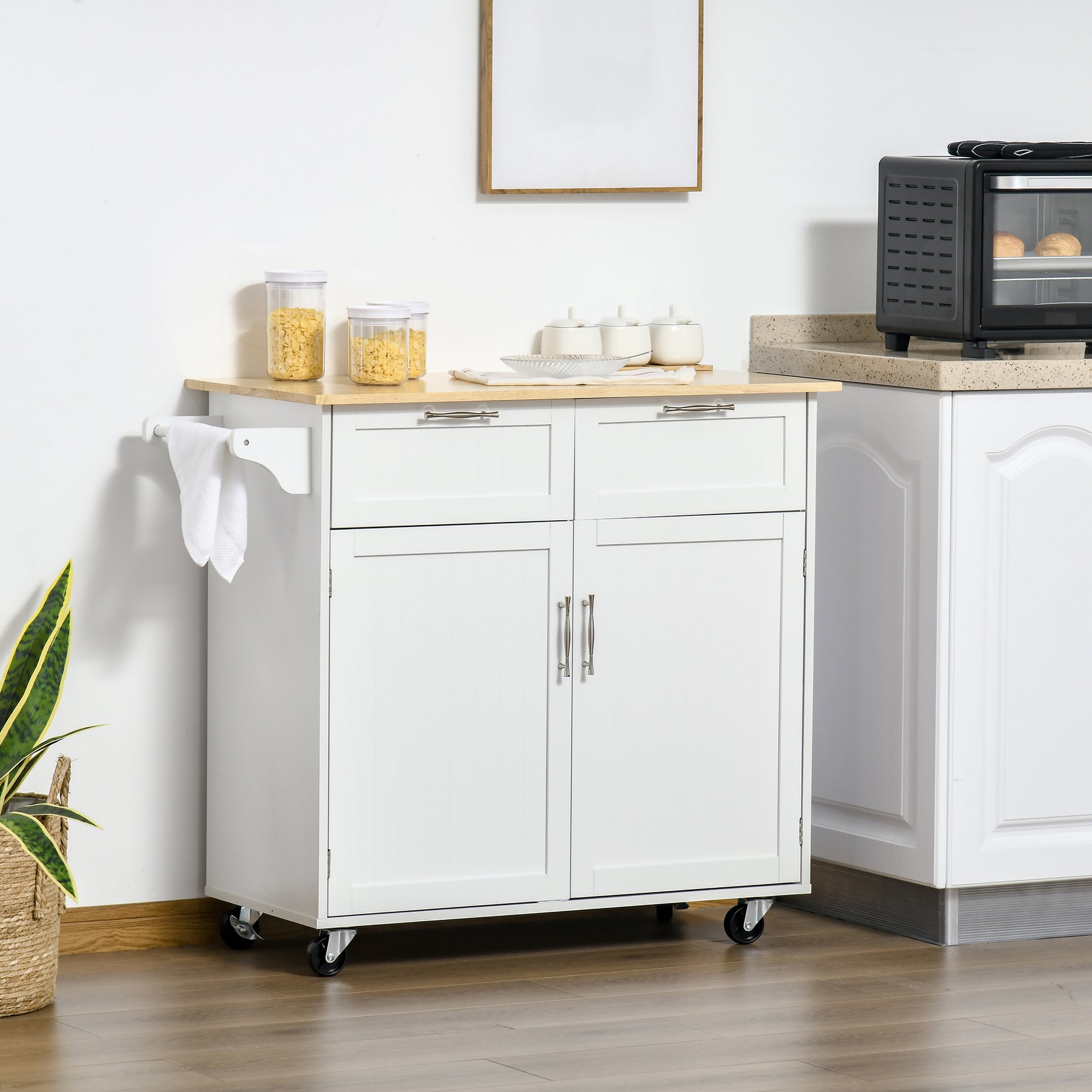 White kitchen island cart with wooden top and silver hardware for ample storage