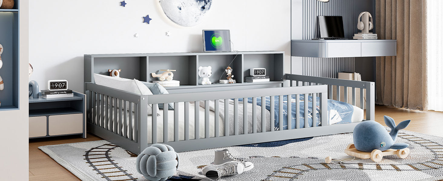 Gray wooden toddler bed with builtin bookshelf and safety rails