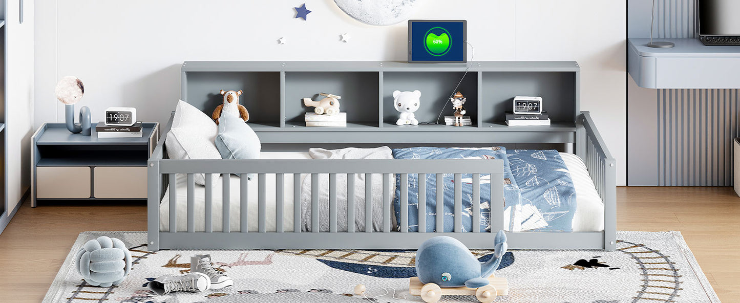 Gray wooden toddler bed with nautical print bedding and stuffed whale toy