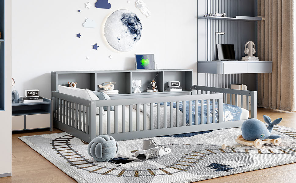 Gray toddler bed with bookshelf headboard and safety rails