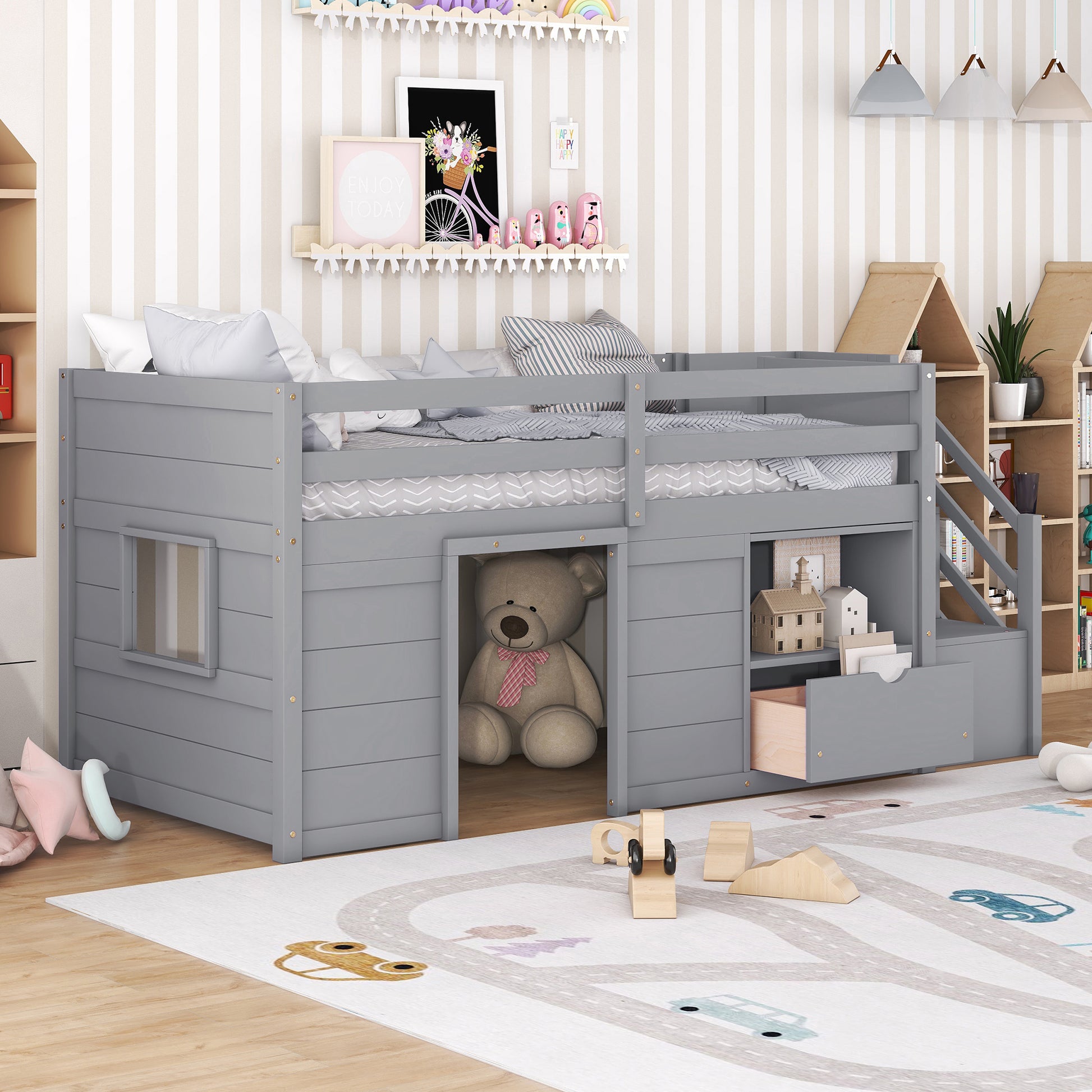 Gray wooden loft bed with builtin playhouse and storage drawers