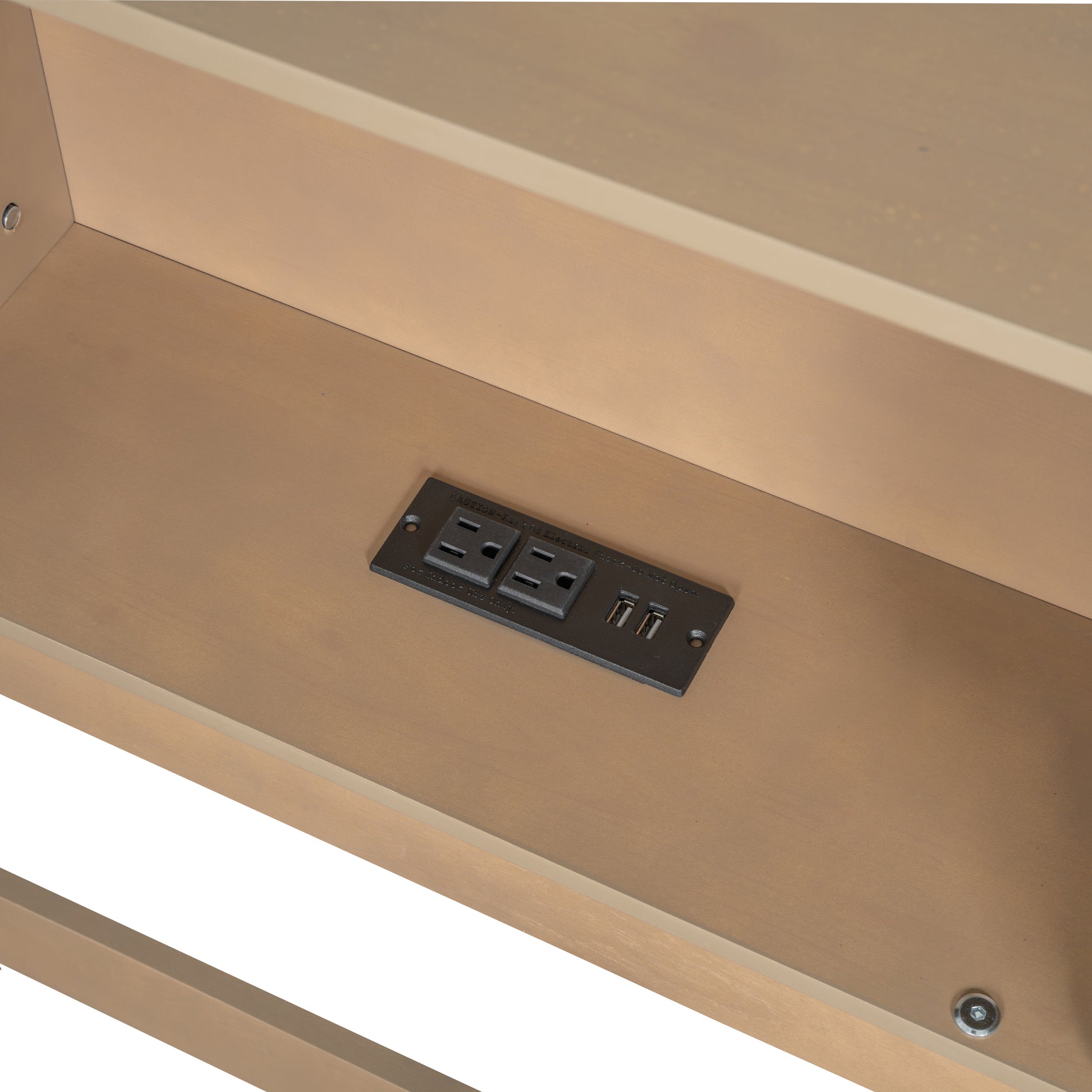 Integrated power strip with  AC outlets and  USB ports on a wooden desk