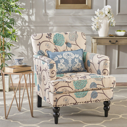 Cream upholstered accent chair with floral print and decorative nailhead trim