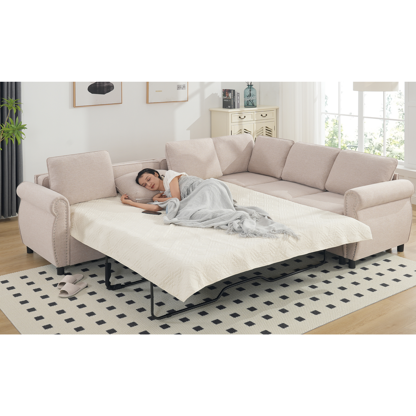 Beige sectional sofa bed with cream quilted mattress in use woman sleeping comfortably
