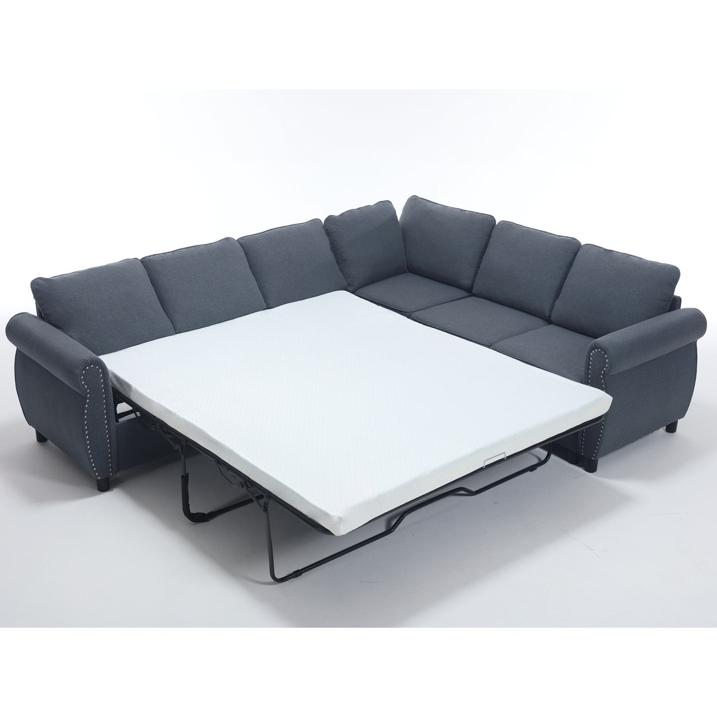 Dark grey upholstered sectional sofa bed pulled out displaying white mattress