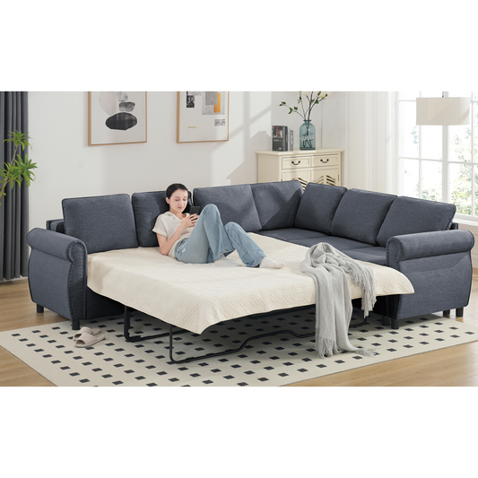 Dark gray upholstered sectional sofa bed with pullout mattress and decorative studs