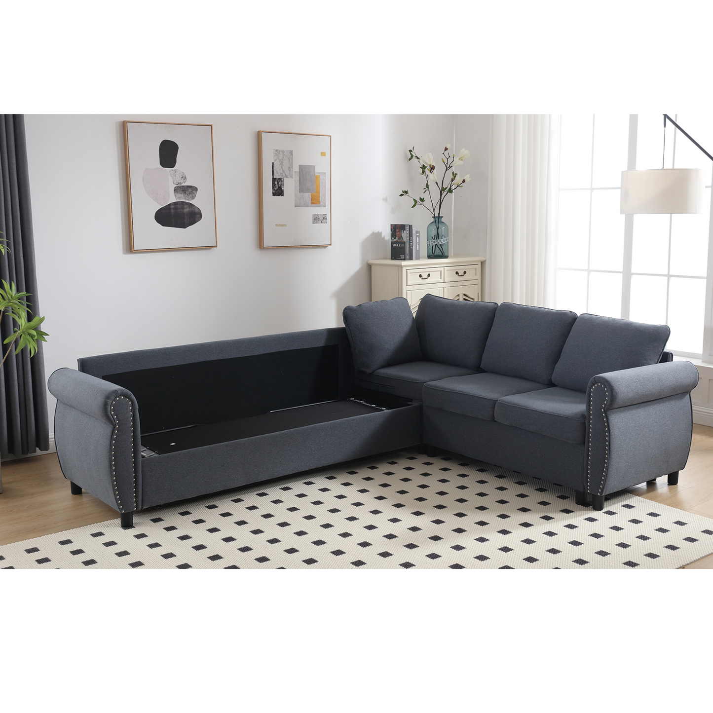 Dark gray fabric sectional sofa with hidden storage and nailhead trim accents
