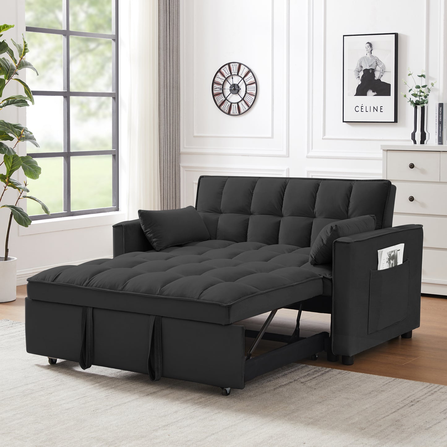 Black upholstered convertible sofa with pullout bed extended featuring tufted cushions and side storage