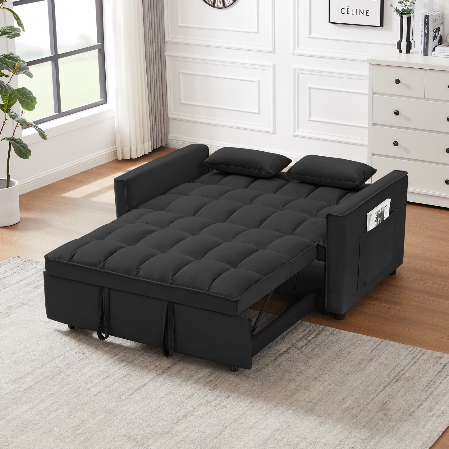 Black tufted convertible sofa bed with storage and side pocket perfect for small spaces
