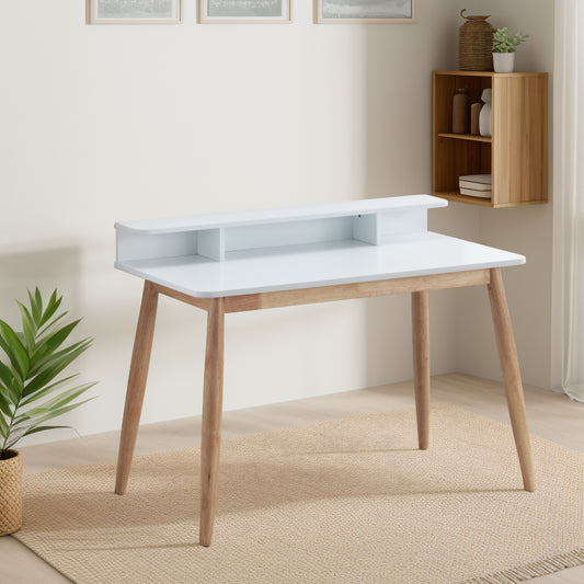 Modern white writing desk with natural wood legs and builtin shelf