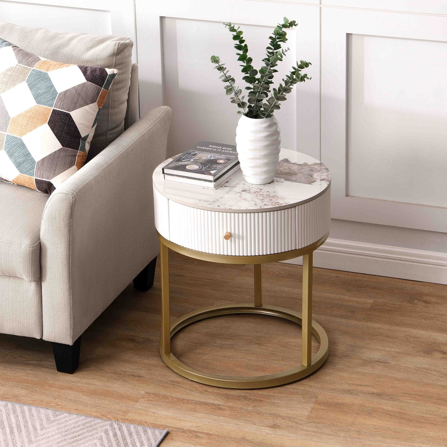White ribbed bedside table with faux marble top and gold base