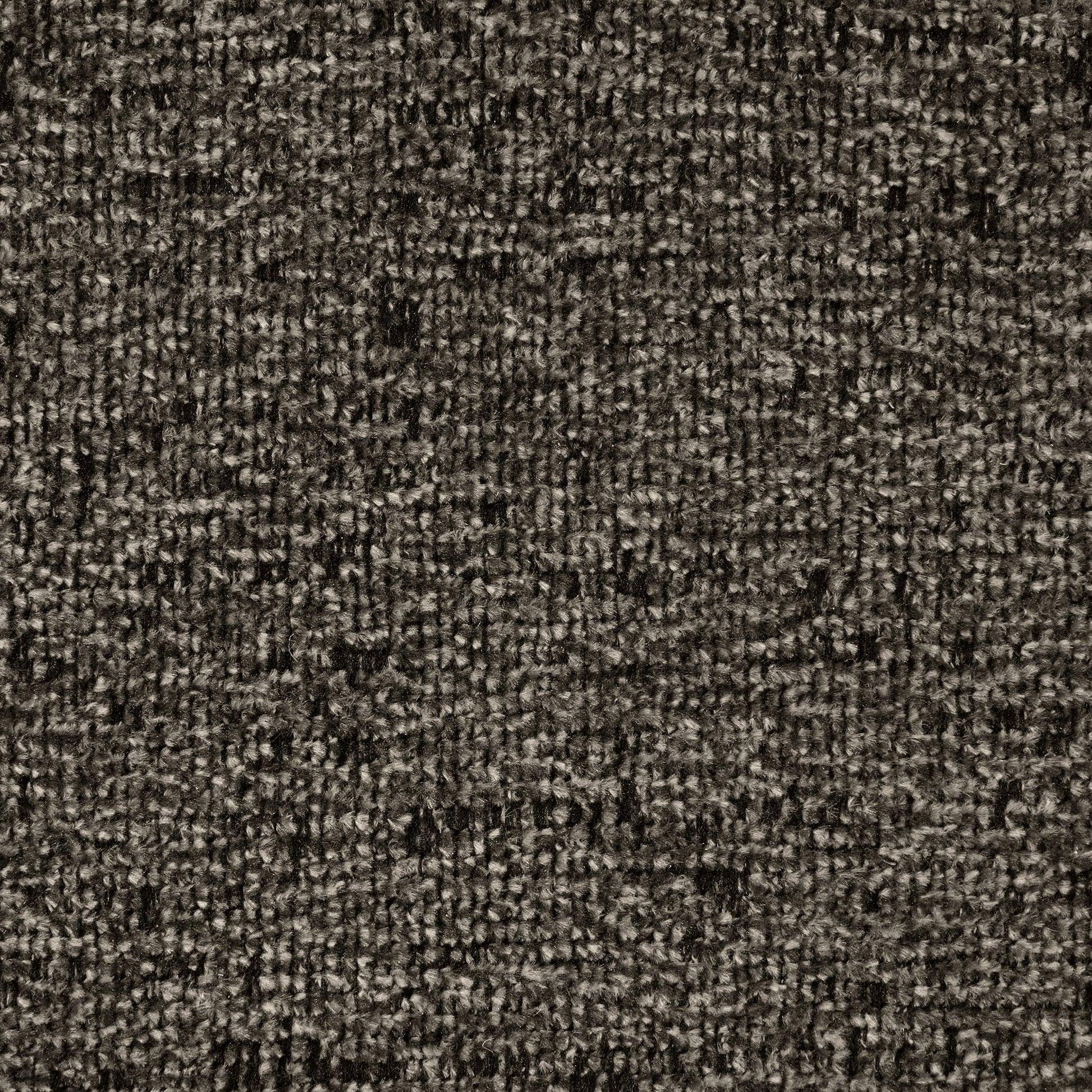 Closeup textured dark gray tweed carpet with flecks of white