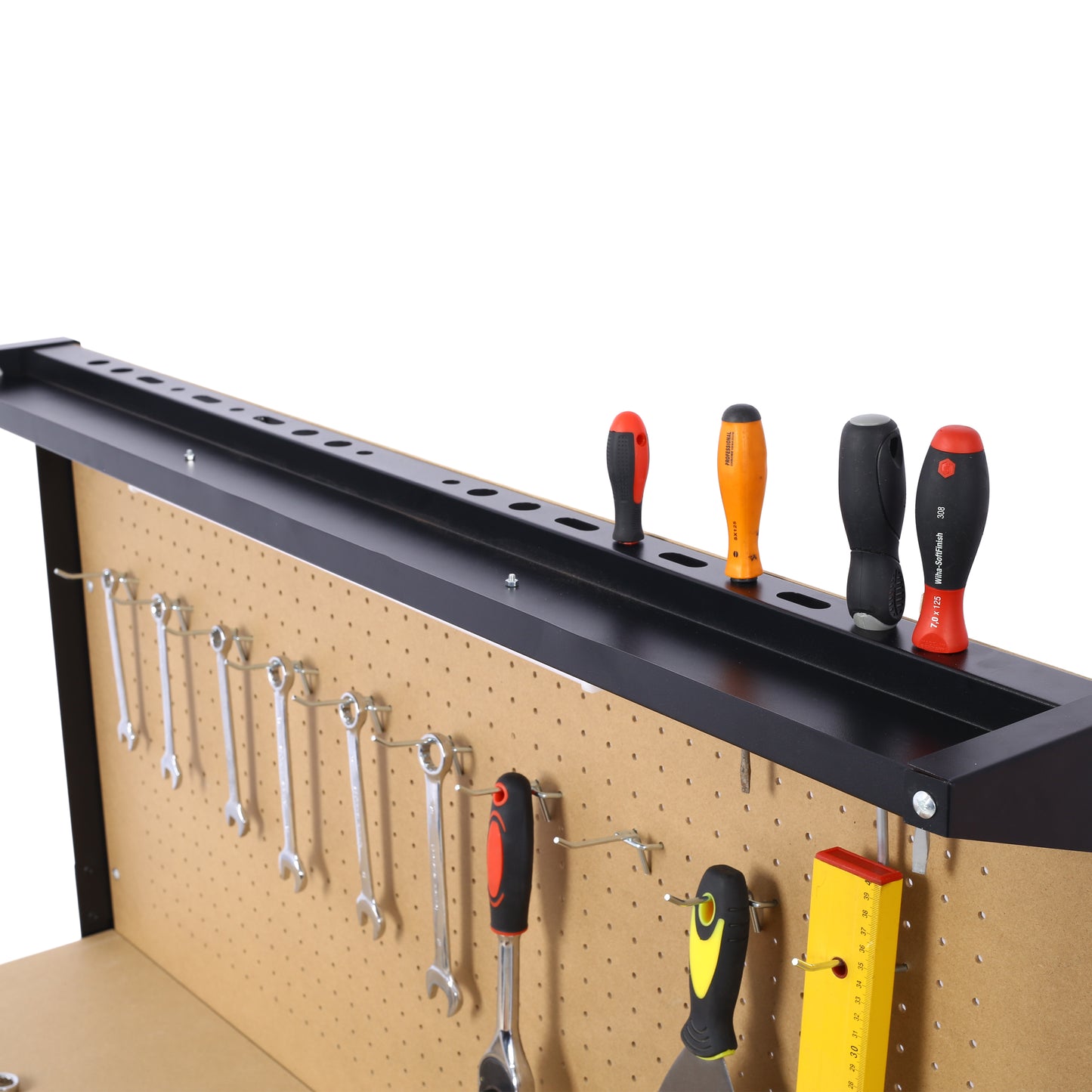 Four screwdrivers with colored handles on a metal shelf above a pegboard for tool storage