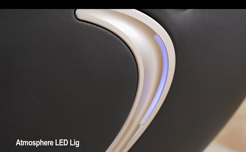 Black leather chair armrest with a curved silver accent and subtle blue LED lighting