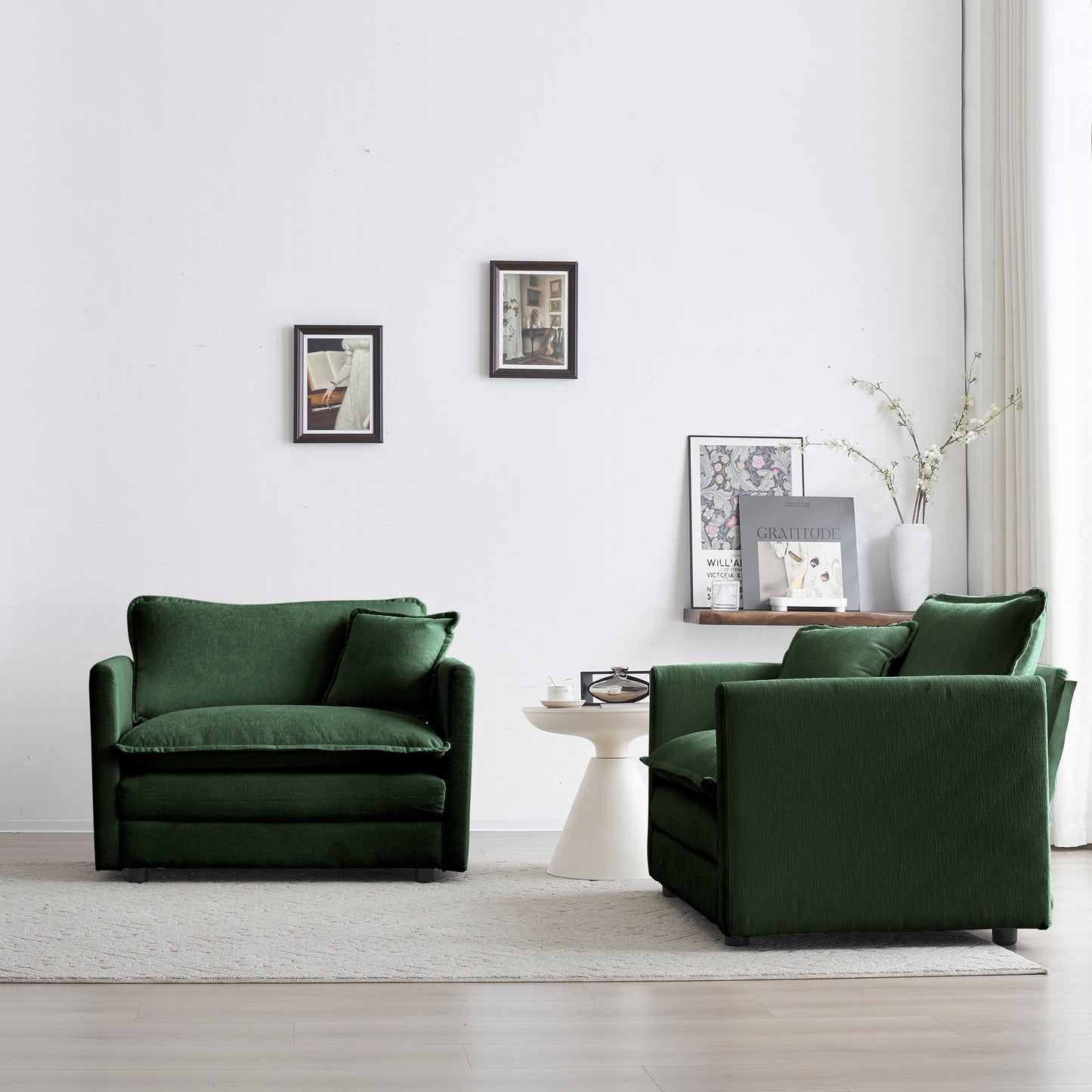 Plush forest green velvet armchair with a single throw pillow perfect for cozy living room seating