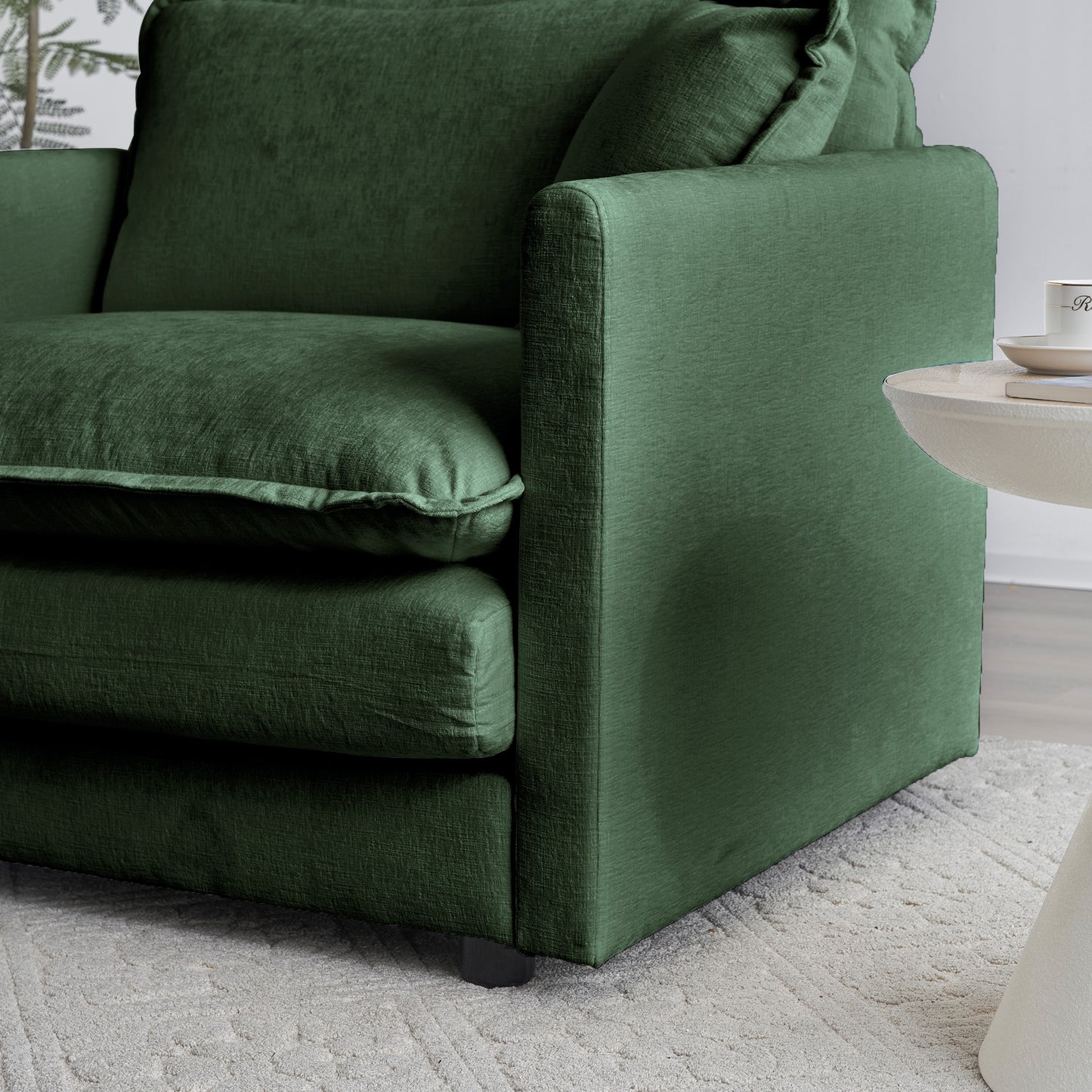 Deep green velvet sofa plush cushions for ultimate comfort contemporary living room decor