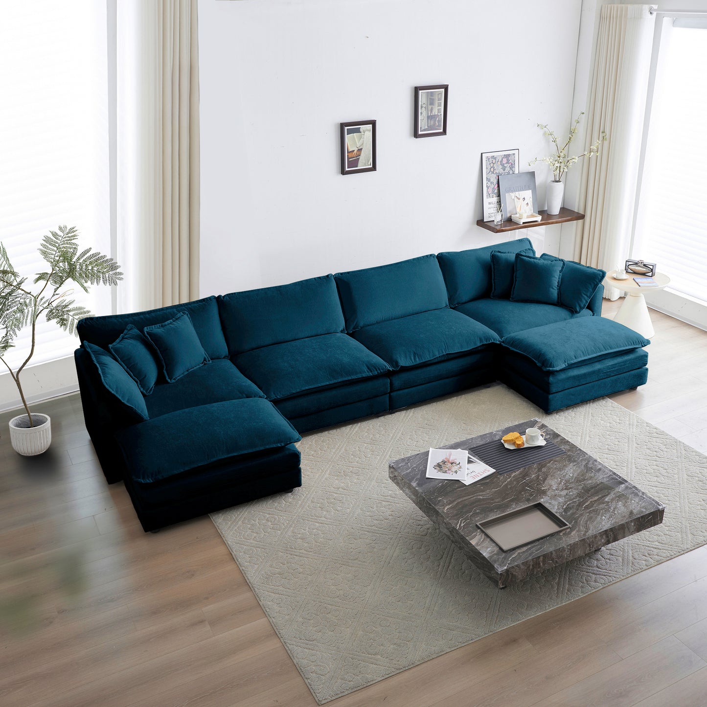 Deep teal velvet sectional sofa with plush cushions and chaise lounger