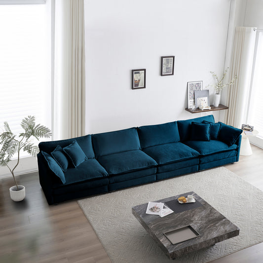 Deep teal velvet sectional sofa with plush cushions perfect for modern living rooms