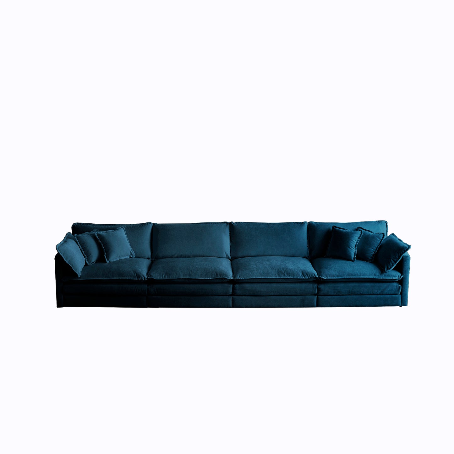 Plush deep teal velvet sectional sofa with generous cushions and accent pillows for ultimate comfort