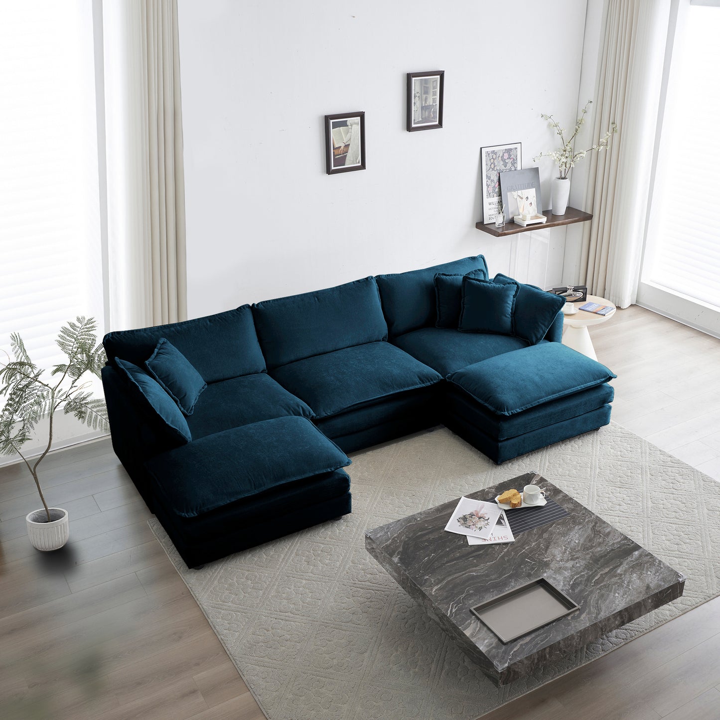 Deep teal velvet sectional sofa with plush cushions and chaise lounge