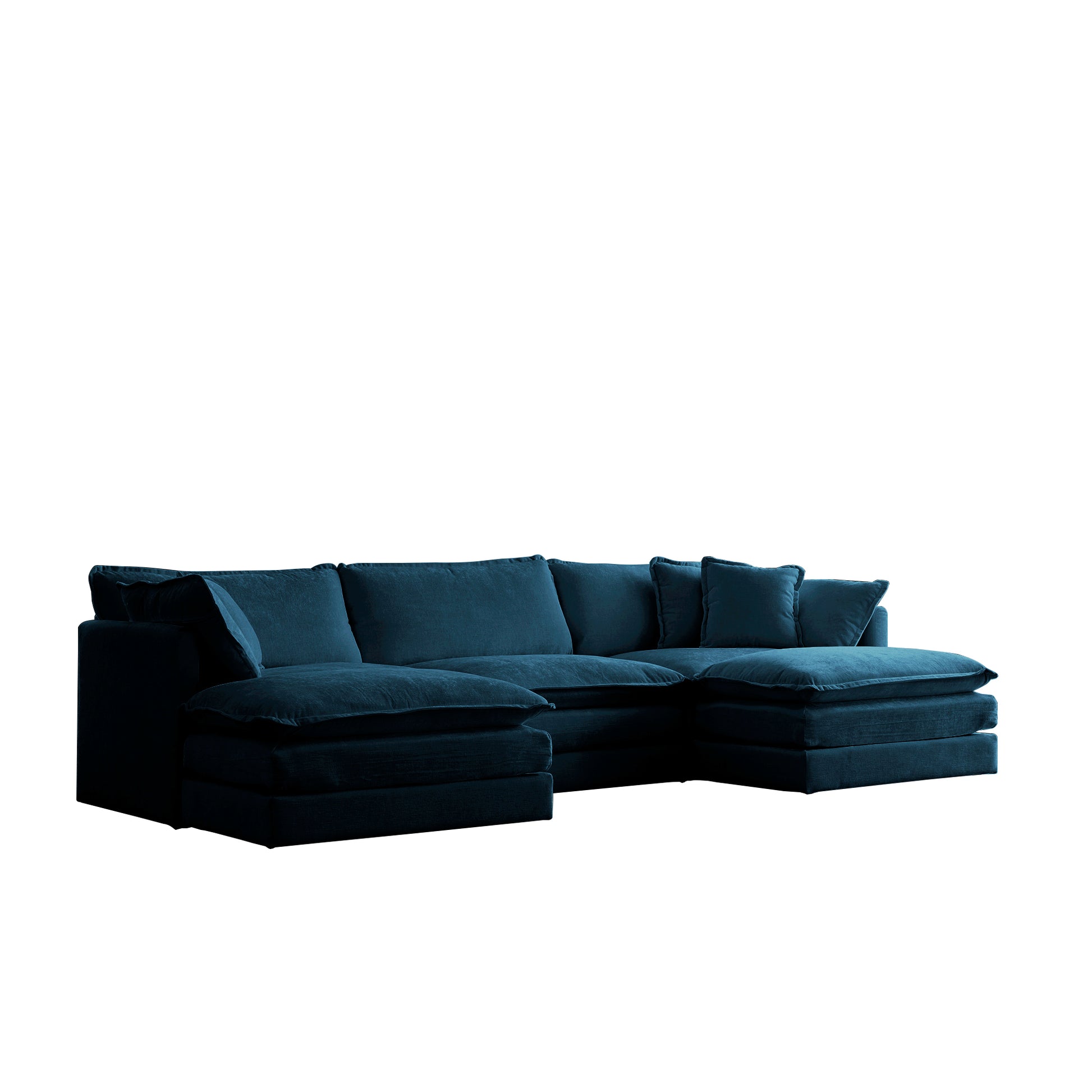 Deep teal velvet sectional sofa with plush cushions and chaise lounge