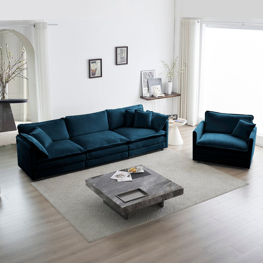 Deep teal velvet sectional sofa with plush cushions creating a luxurious living room centerpiece