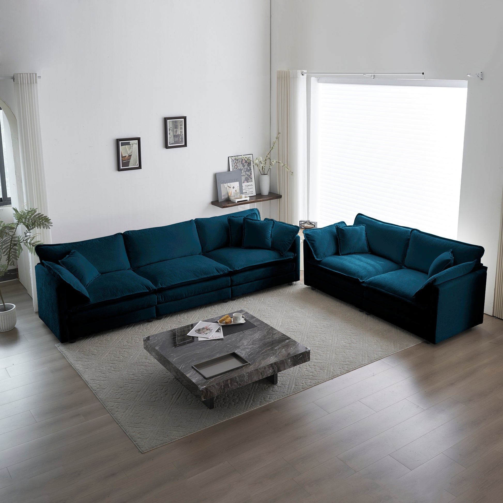 Plush teal velvet sectional sofa with deep cushions for comfortable living room seating