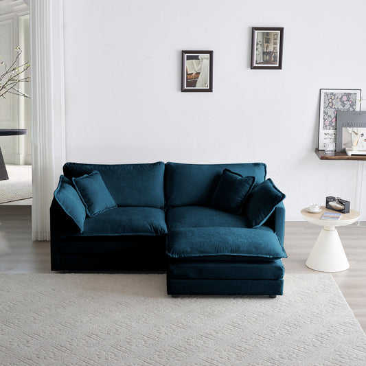 Deep teal velvet sectional sofa with plush cushions and chaise