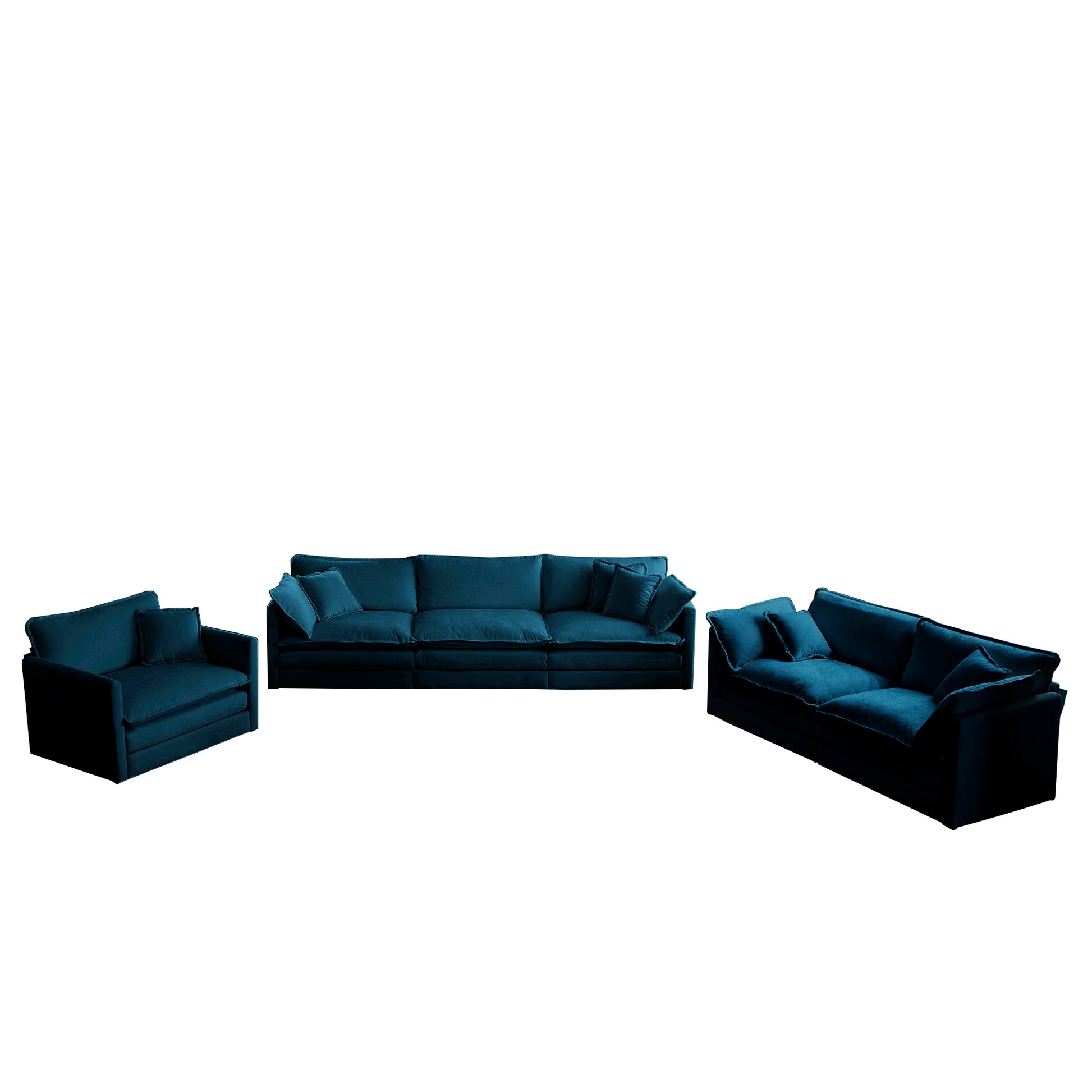 Plush teal velvet modular sofa with deep cushions and matching throw pillows
