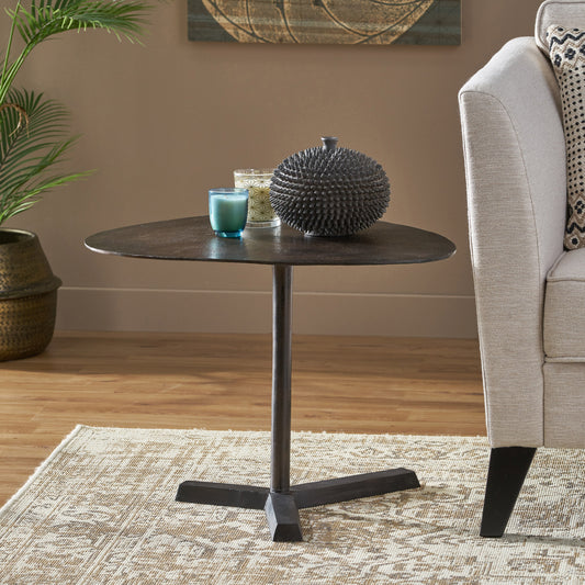 Dark metal tripod base side table with a triangular top perfect for contemporary living spaces