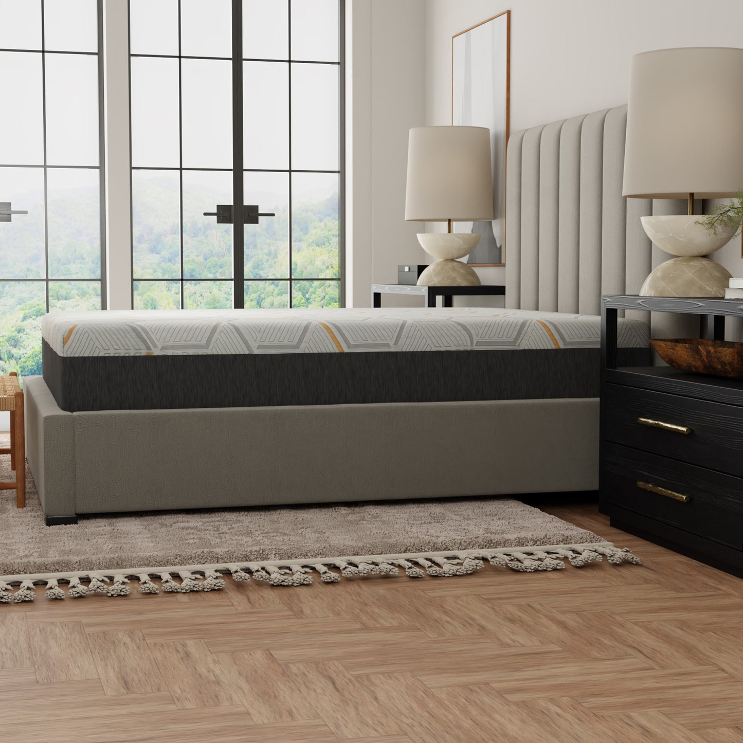 Modern grey and white patterned mattress with yellow accents on a upholstered bed frame