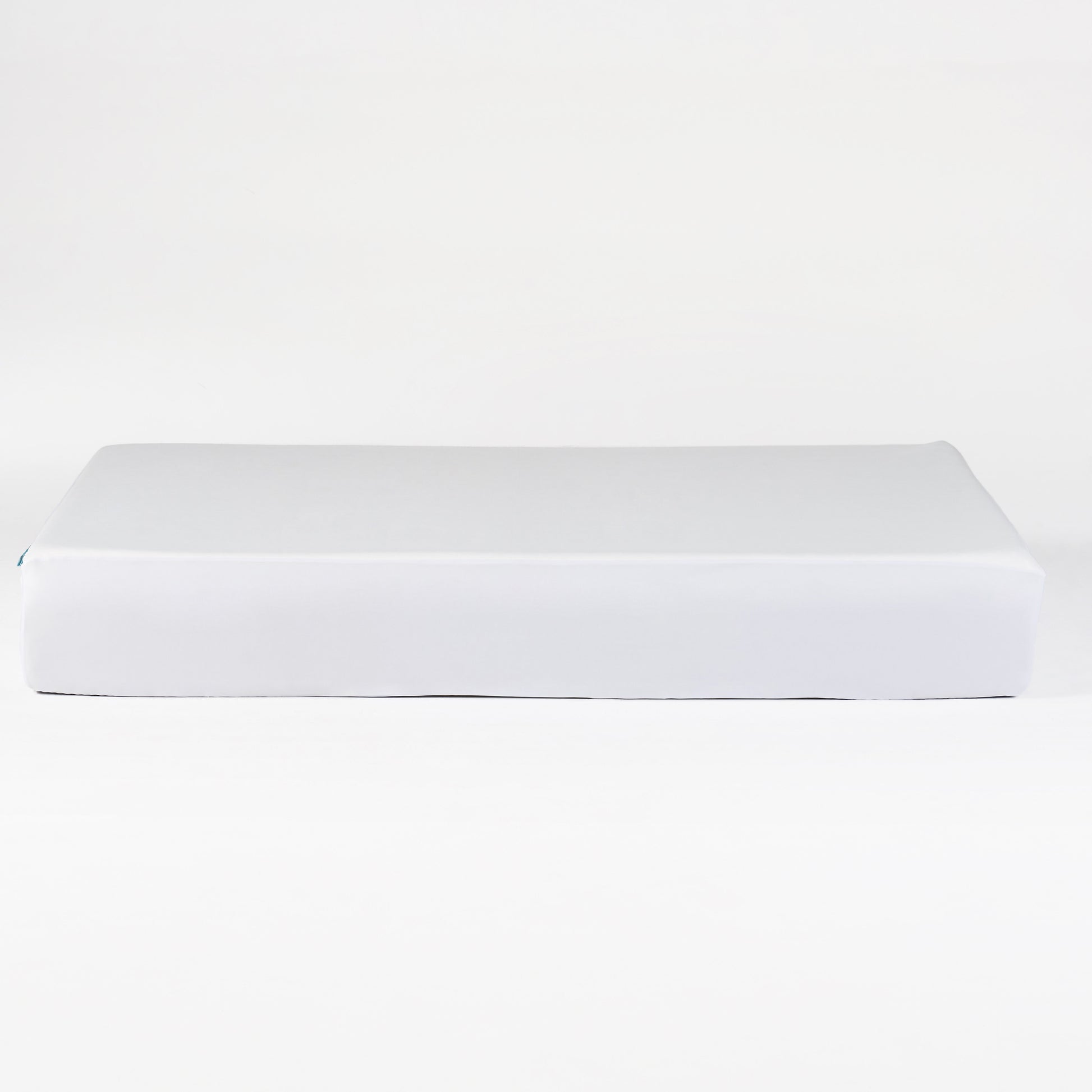 White cotton twin sheet with fitted elastic corners for easy use
