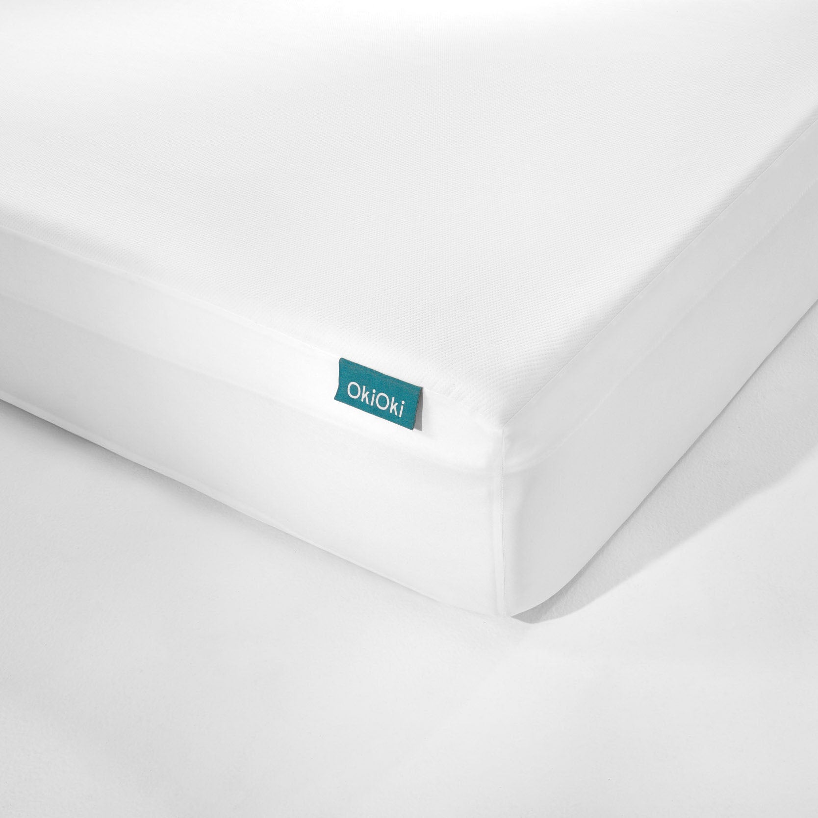 White OkiOki mattress protector breathable and waterproof fabric perfect for bedrooms