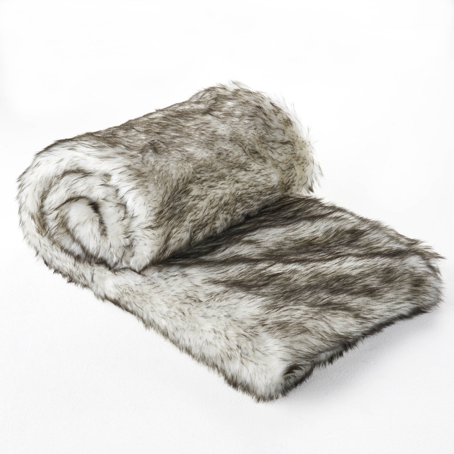 Rolled plush throw blanket with realistic wolf fur pattern in grey and white tones
