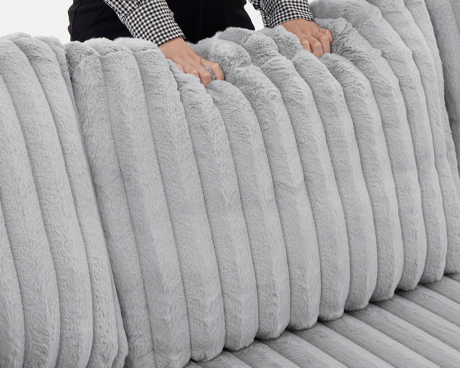 Plush gray throw pillow with ribbed texture perfect for sofa comfort