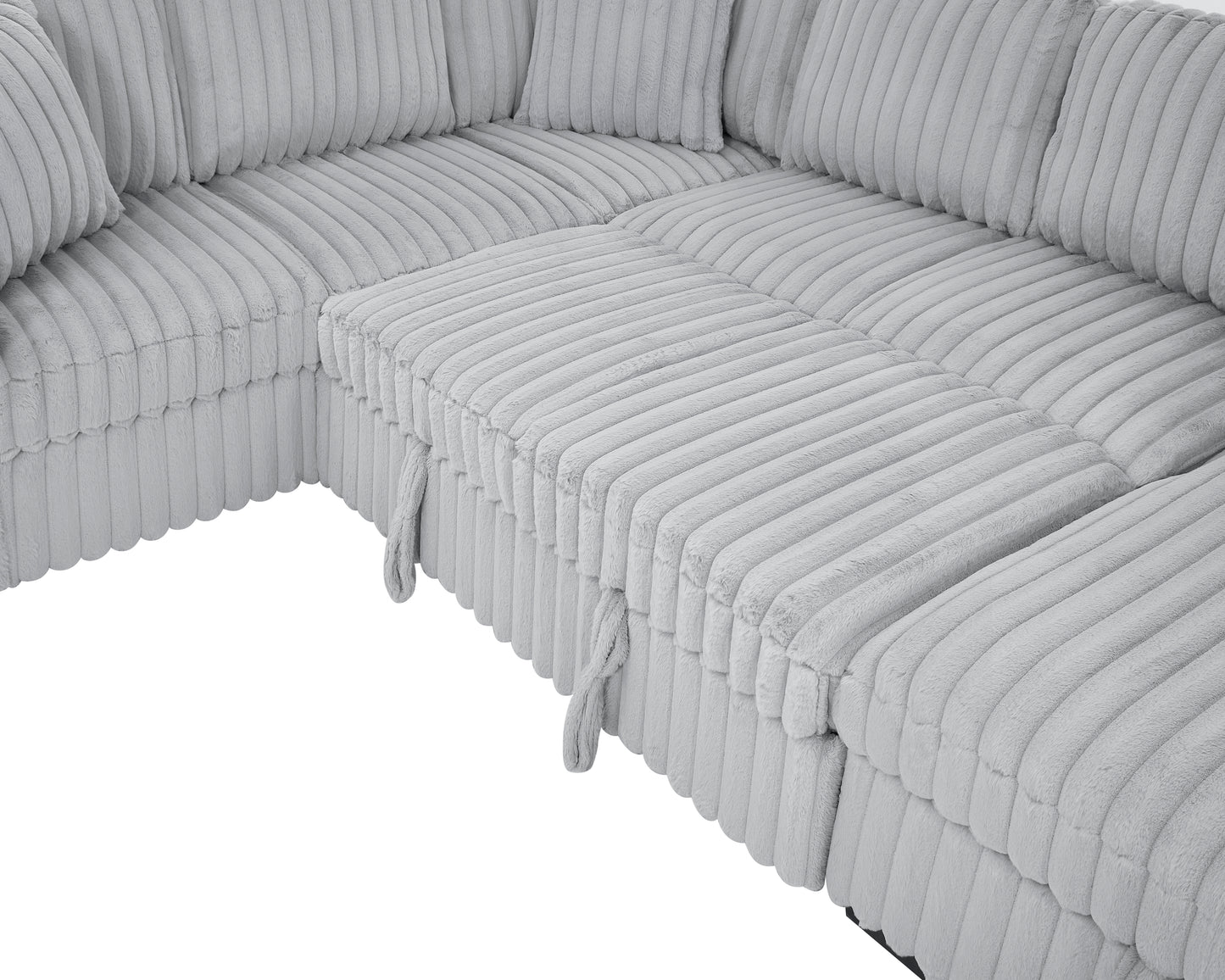 Plush grey corduroy sectional sofa with matching throw pillows perfect for a cozy living room