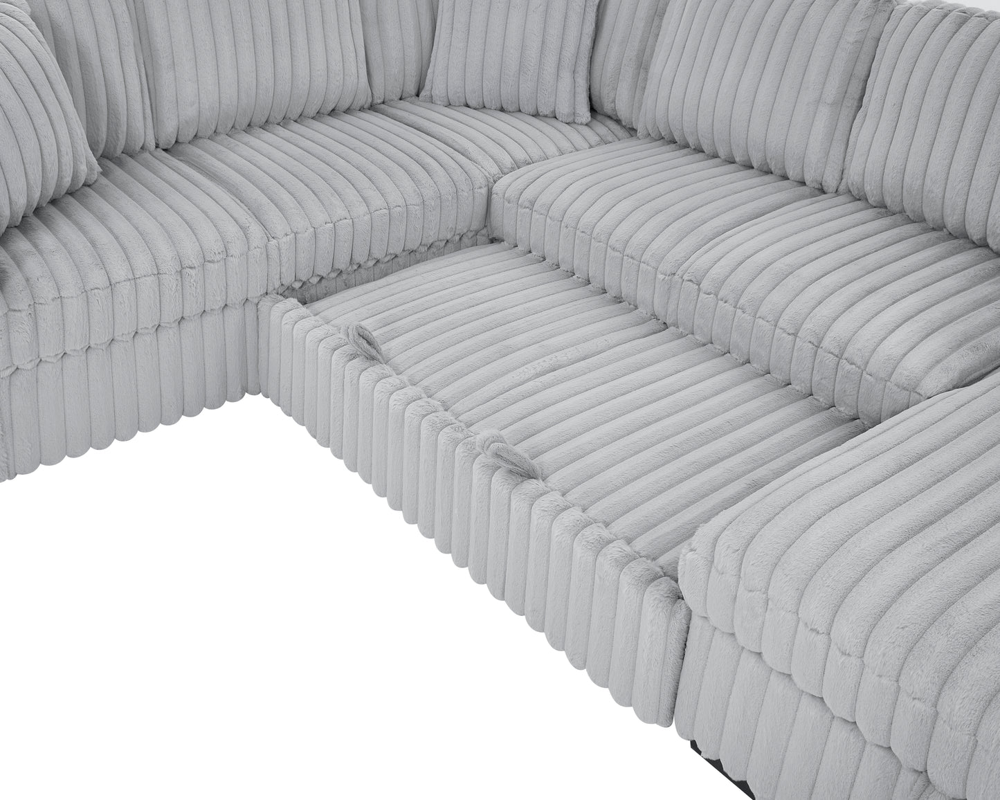 Plush light grey corduroy sectional sofa with plush pillows and ample seating space