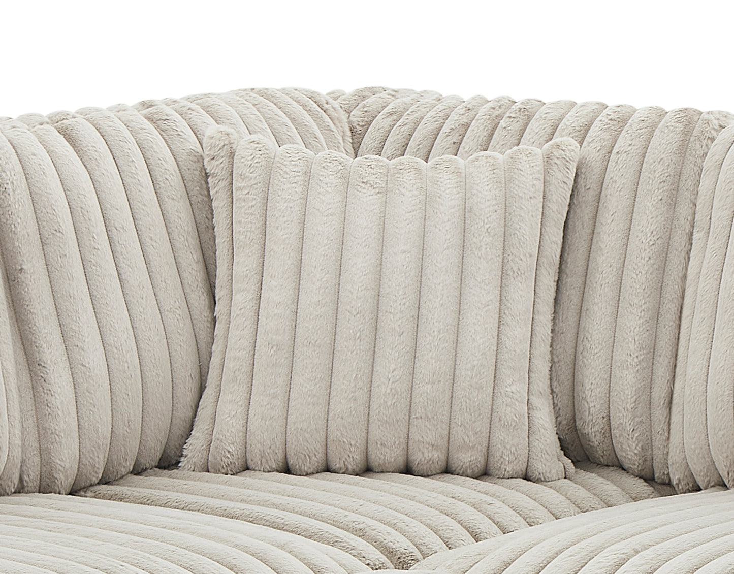 Plush cream corduroy cushion with vertical ribbing texture for a cozy sofa accent